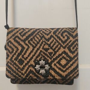 Patricia Nash Black and Tan Woven Crossbody with Floral Clasp